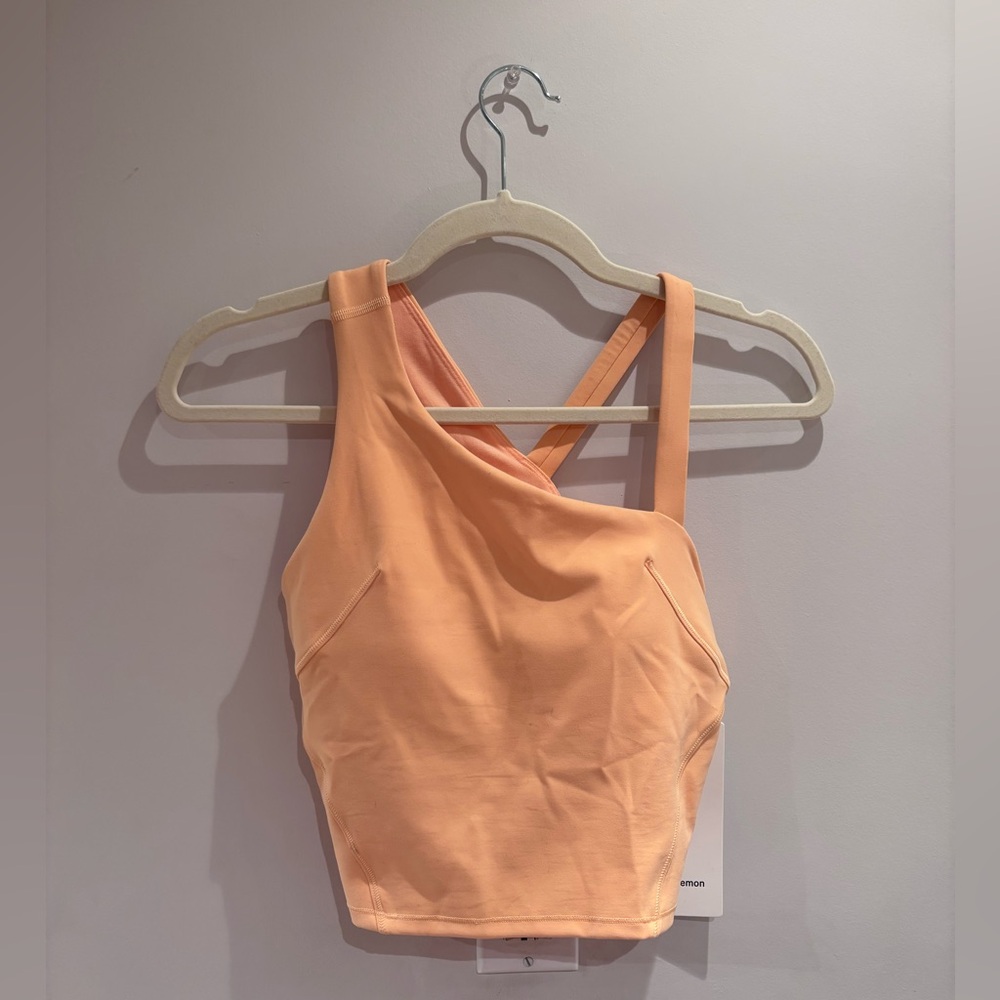 Lululemon Everlux Asymmetrical Tennis Tank in Peach